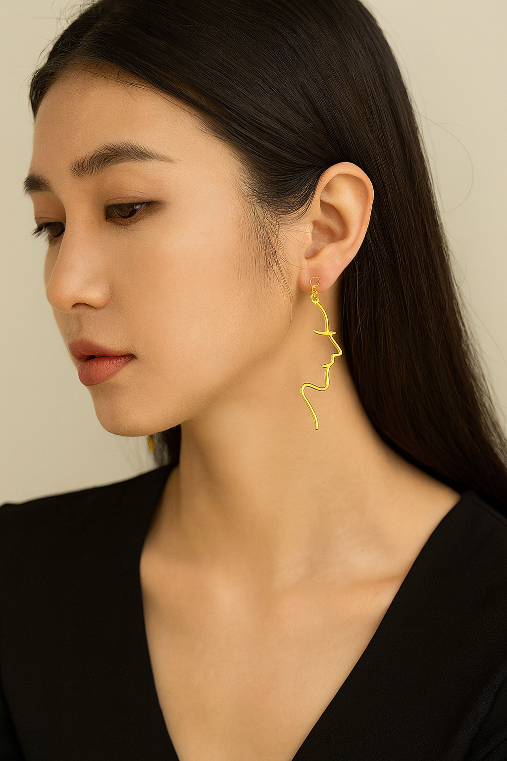 Face Outline Gold Earrings